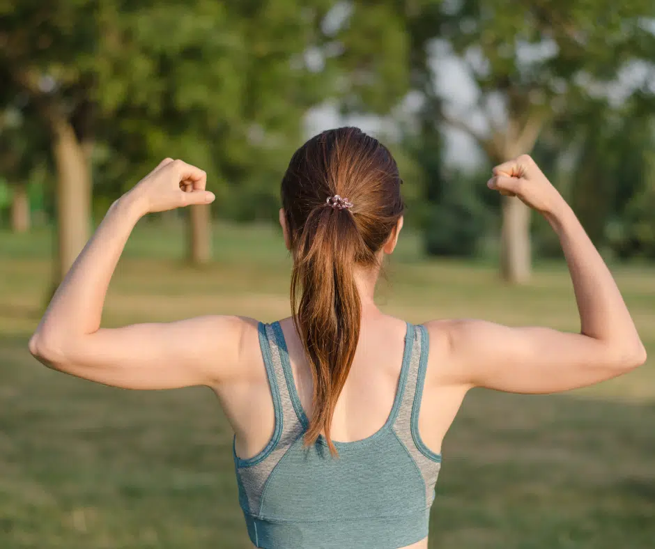 woman with muscles, woman showing muscles